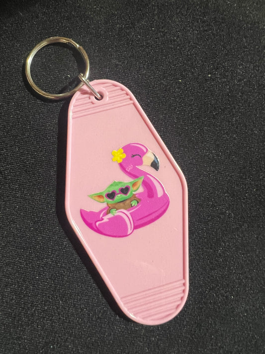 Baby Yoda in a Pink Flamingo motel style keychain